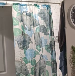 Manatee and rabbit shower curtain